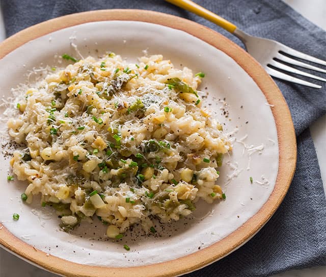 Roasted corn and poblano risotto with grated parmesan cheese