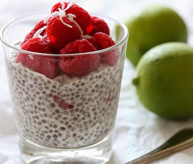 A cup of coconut lime raspberry chia pudding