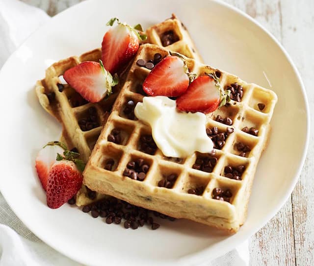 Stack of chocolate chip almond waffles made with Almond Breeze Vanilla Almondmilk