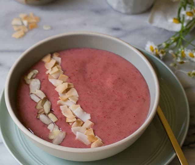 Almond strawberry smoothie bowl topped with Blue Diamond Almonds