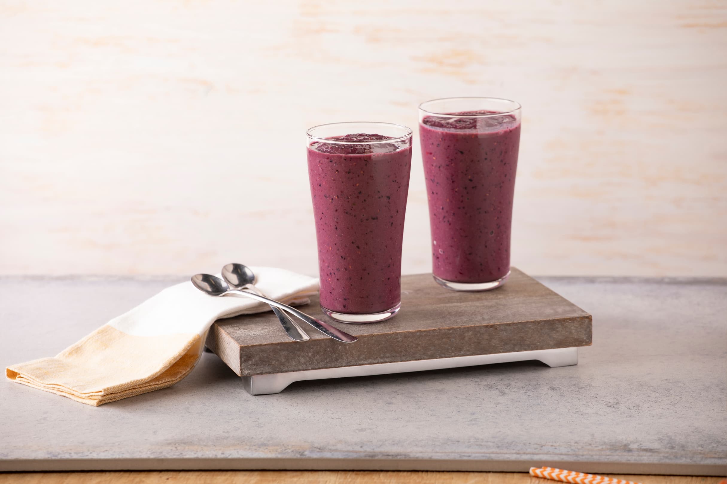 Two glasses of dairy-free berry chocolate smoothie